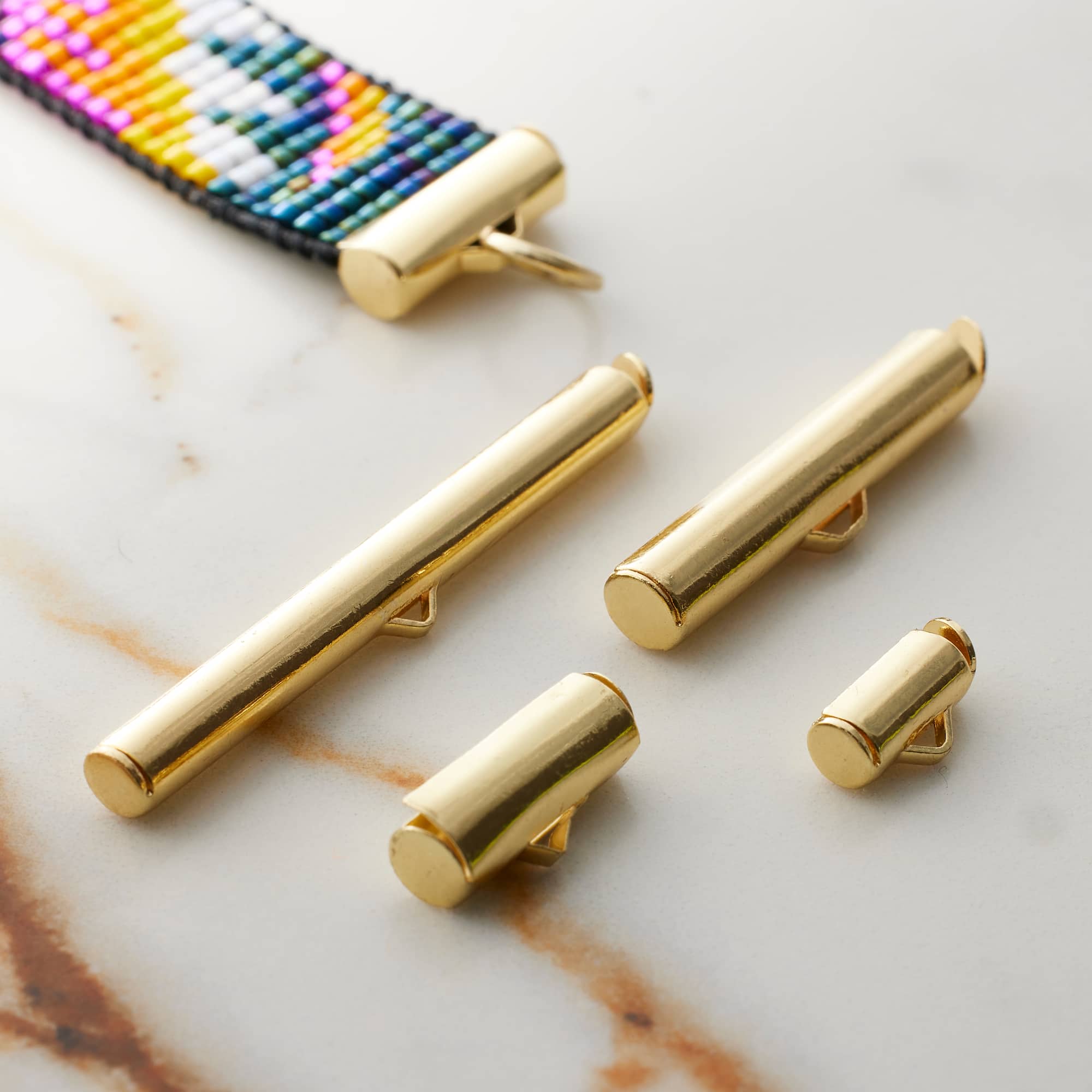 Mixed Metal Slider End Tubes by Bead Landing